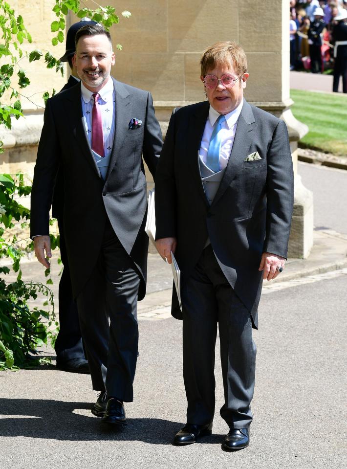  Sir Elton with husband David Furnish at the Royal Wedding in Windsor today