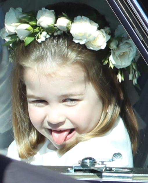  Cheeky Princess Charlotte stuck her tongue out for the cameras as she left the wedding ceremony