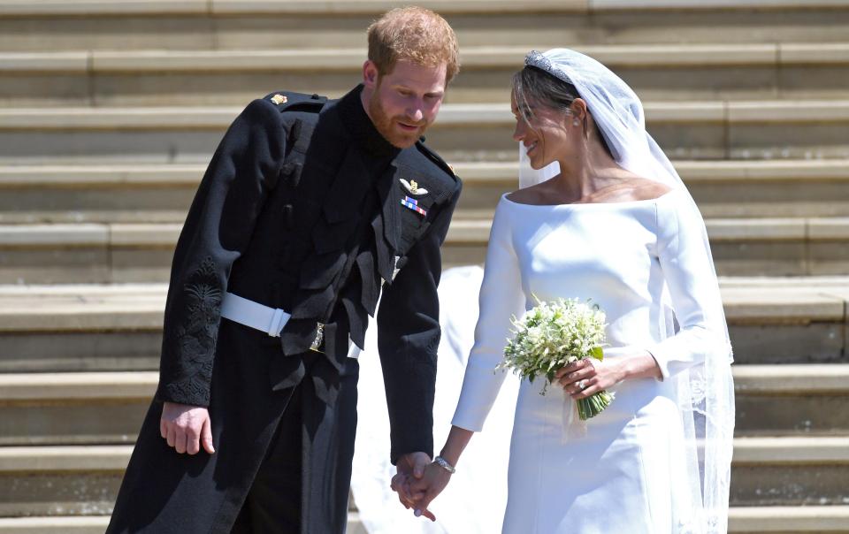  Harry and Meghan on the steps of St George's Chapel after their wedding ceremony