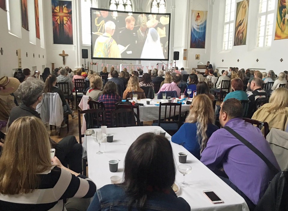 The Royal Wedding is screened inside St Andrew’s Anglican Church in Russia