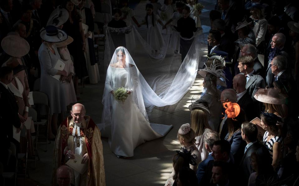  Meghan's dress included a 16-foot veil