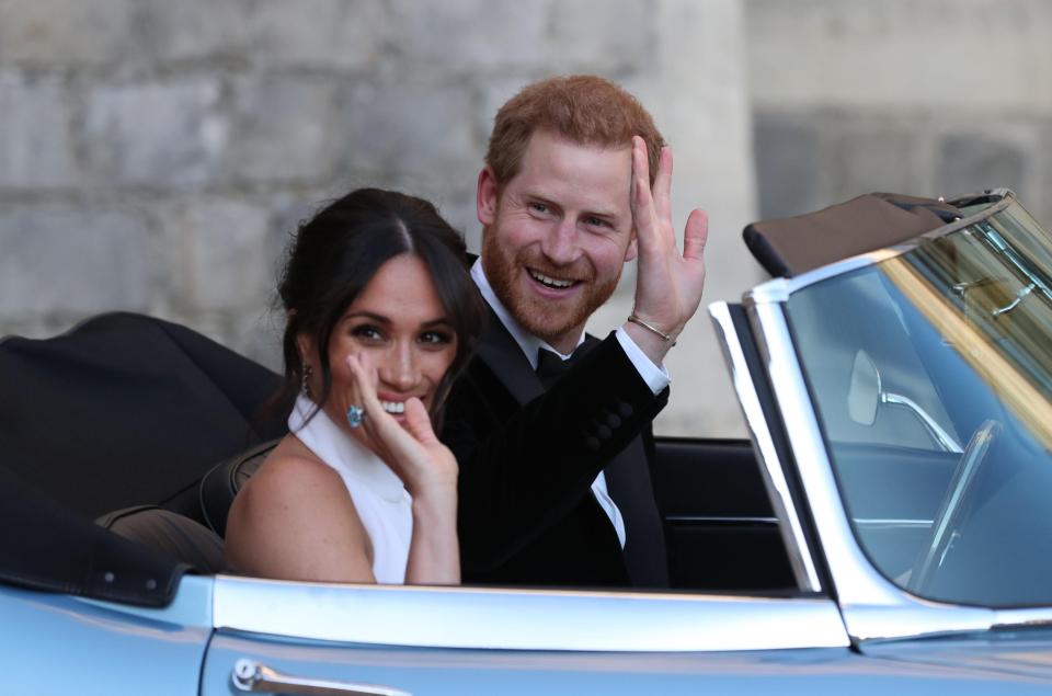  The newlyweds looked like Hollywood stars in their open top convertible with Meghan wearing an emerald cut aquamarine diamond which once belonged to Princess Diana