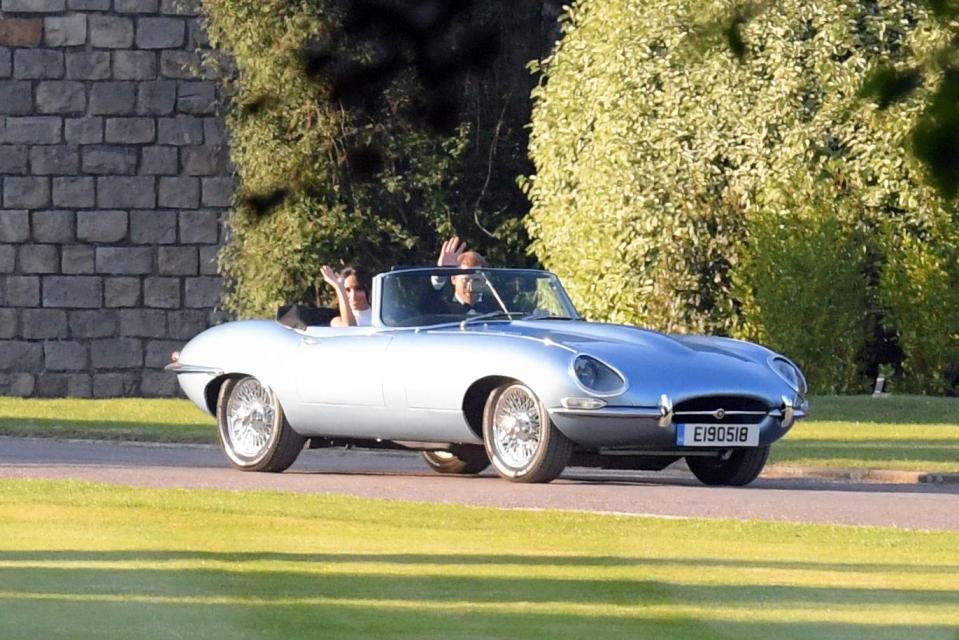  Meghan and Harry leave for the reception in an E-type Jaguar, which has the date of their wedding on the licence plate