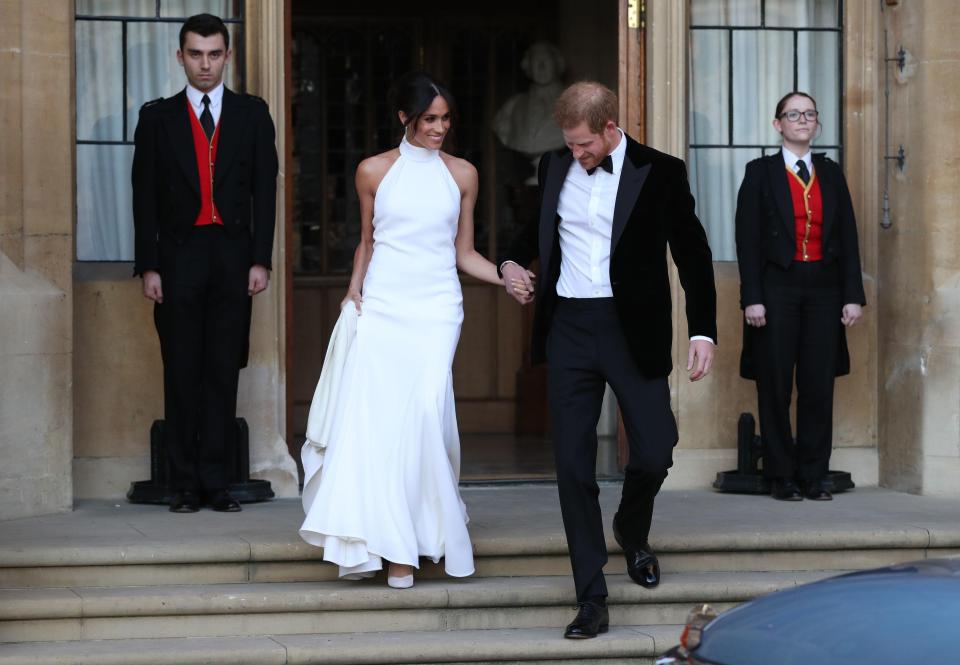  Newlyweds Meghan and Harry head out together to their star-studded reception