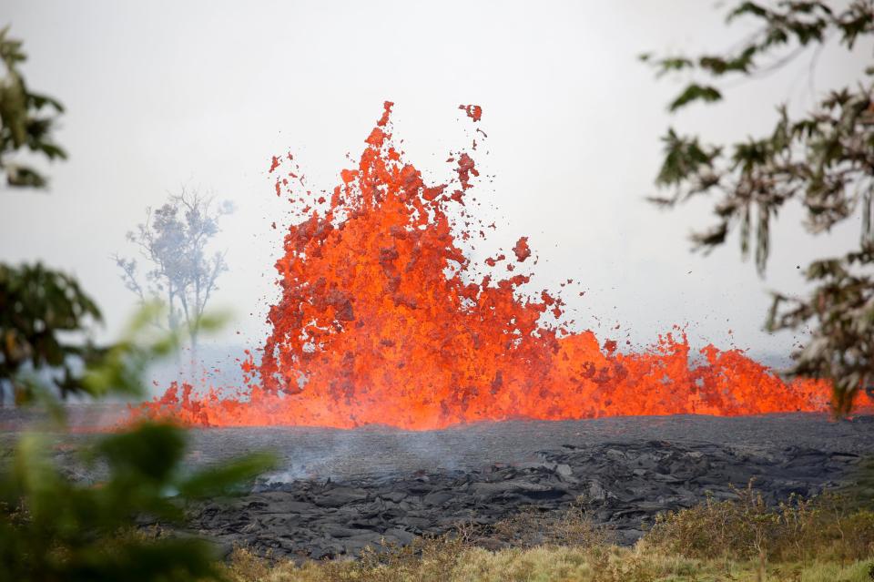  Molten rock is thrown into the air from Hawaii's Mount Kilauea volcano