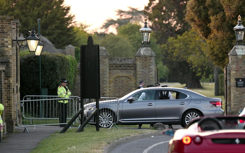  George Clooney sat in the back of a silver Audi and chatted to police security for ten minutes