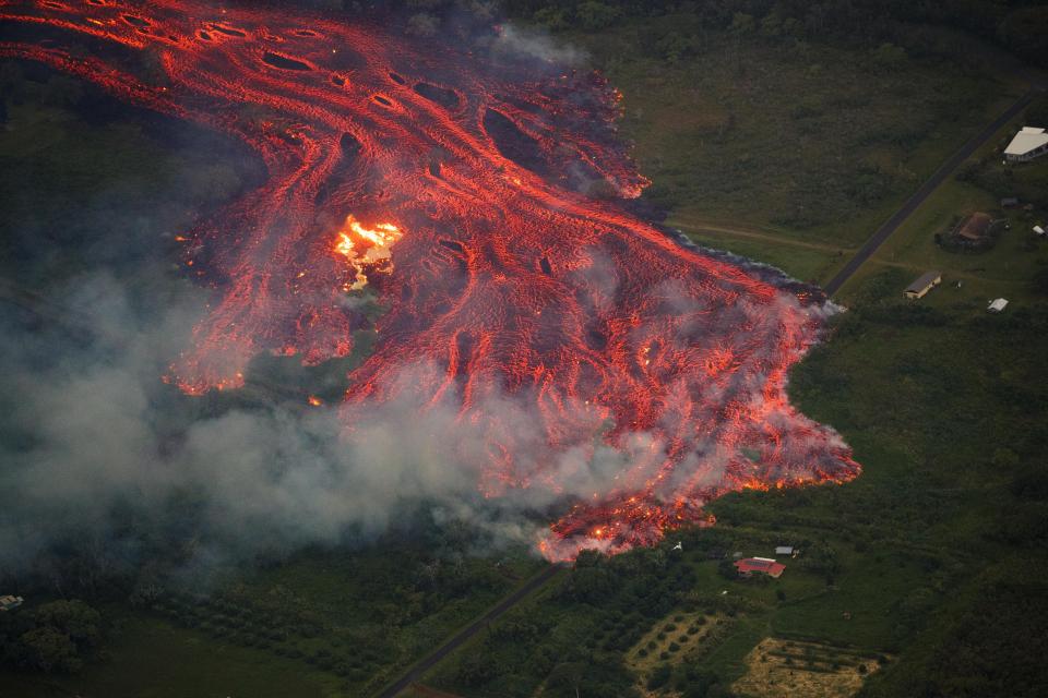  A river of lava moments before swallowing up a home in Pahoa, Hawaii