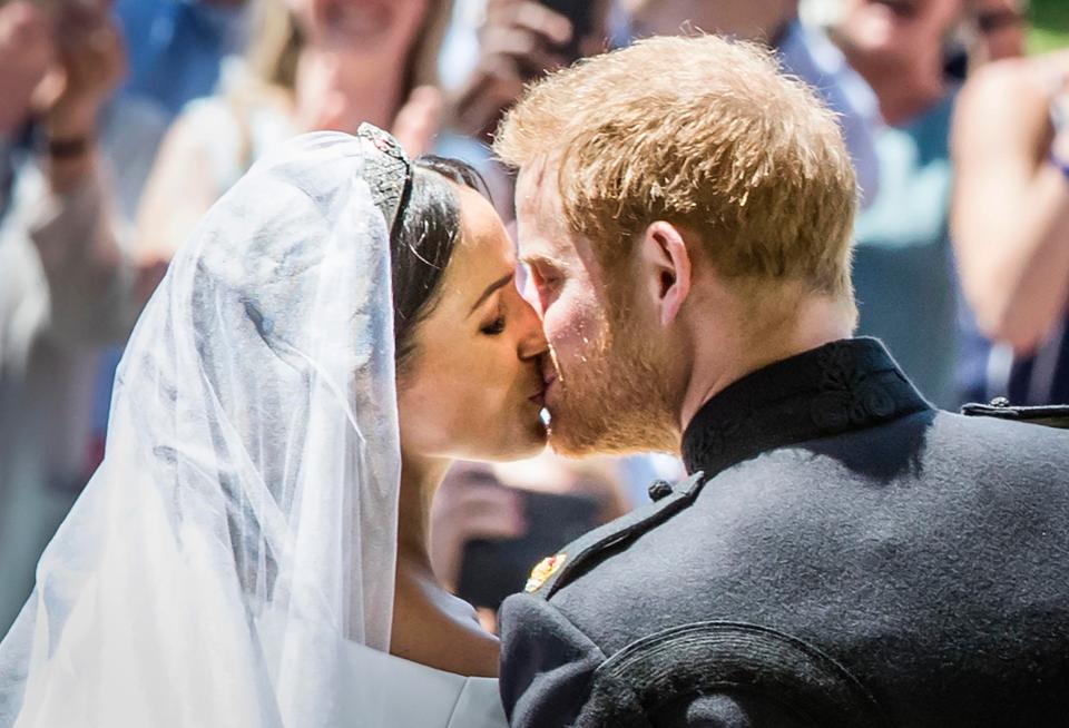  Millions of people watched Prince Charles walk Meghan Markle down the aisle