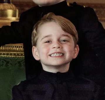  Prince George may normally be shy, but the schoolboy managed to pull out a cheeky smile for the camera