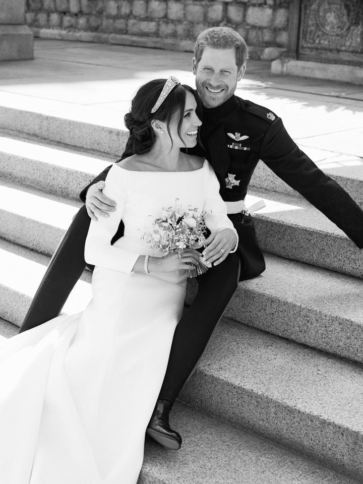  Meghan smiles next to her new husband Prince Harry in the romantic photograph taken by Alexi Lubomirski