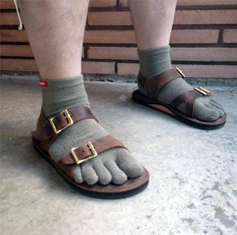  We think the socks and sandals combination is just a little toe much