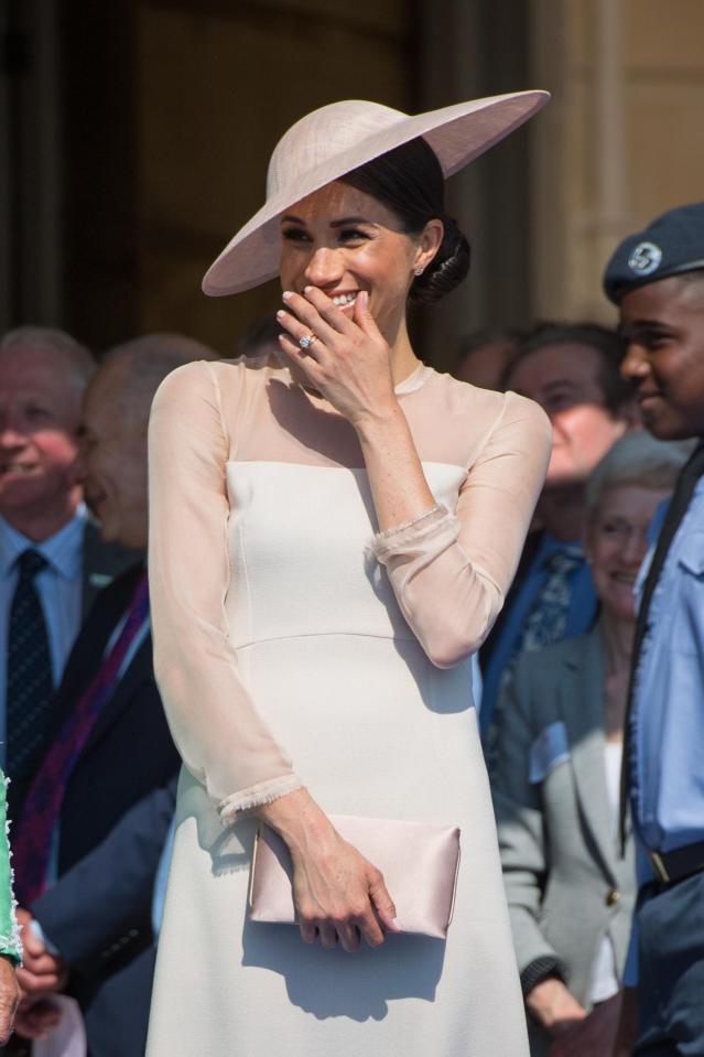  Meghan Markle was pretty in pink for her first official royal outing wearing a Goat dress