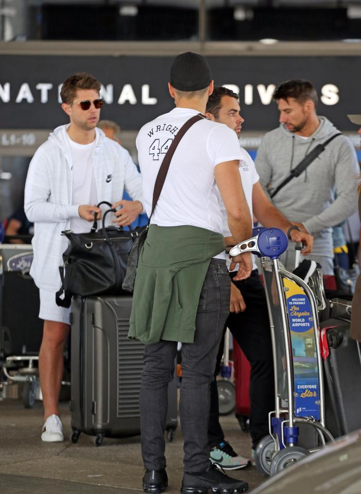  The group are all wearing matching T-shirts to celebrate Josh's stag do