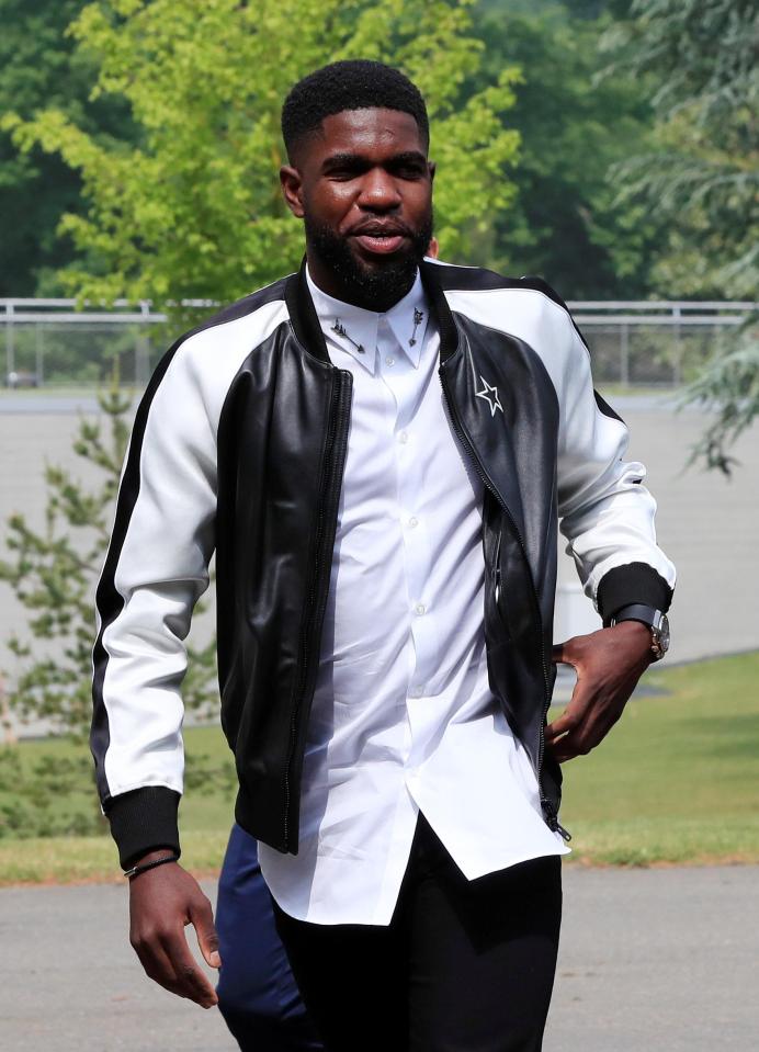  Samuel Umtiti sported a black and white leather jacket on his way to France HQ