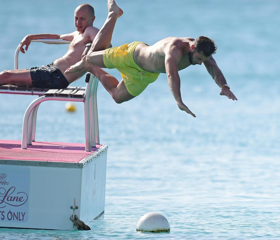  Charlie Austin practises his diving technique during Barbados holiday