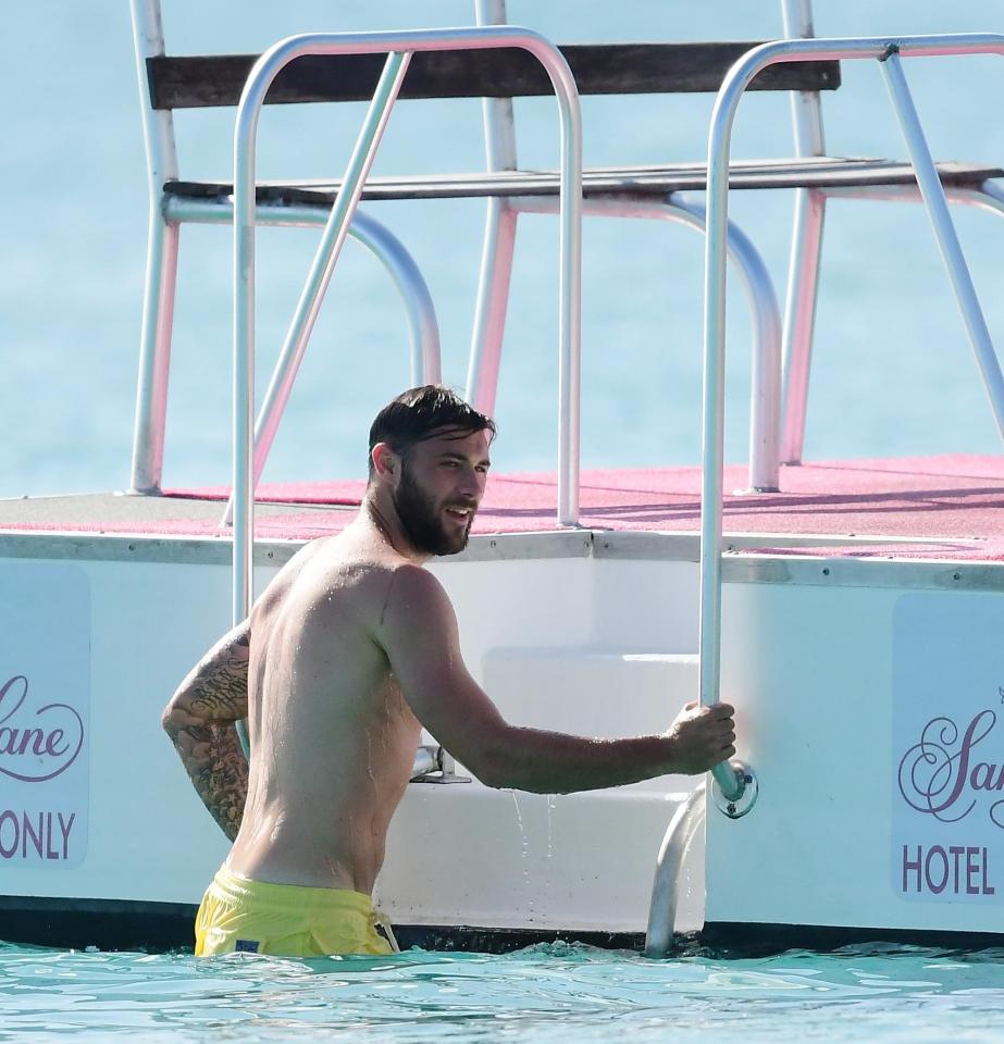  Southampton striker Charlie Austin climbs back onto platform to jump back in the ocean