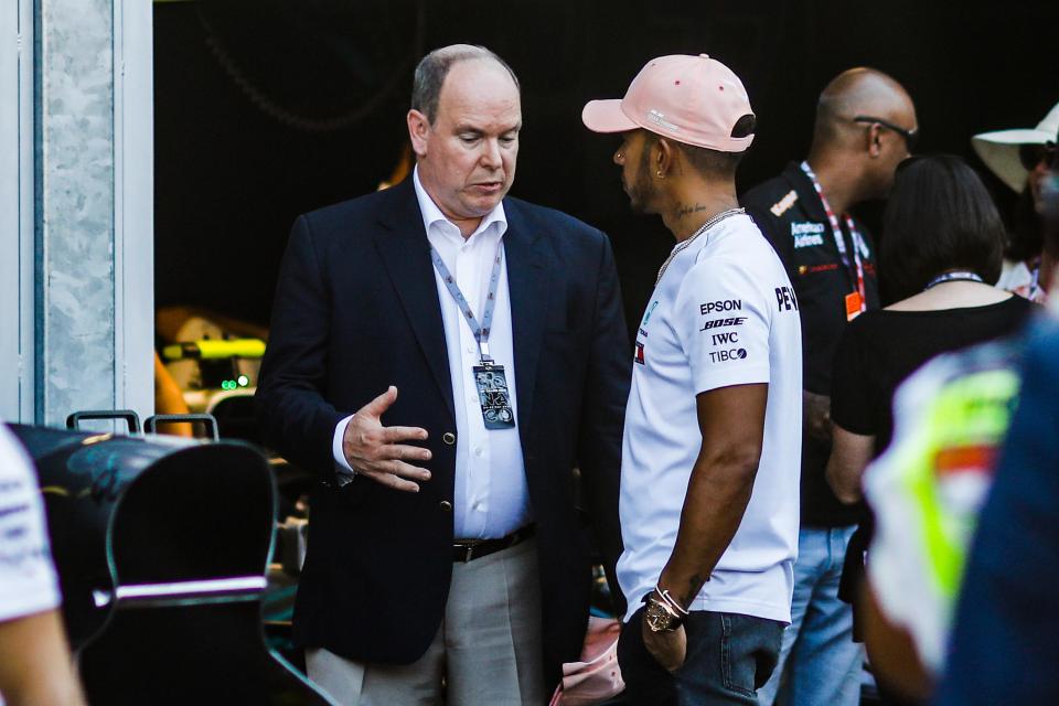  Lewis Hamilton speaks with Prince Alberto II of Monaco