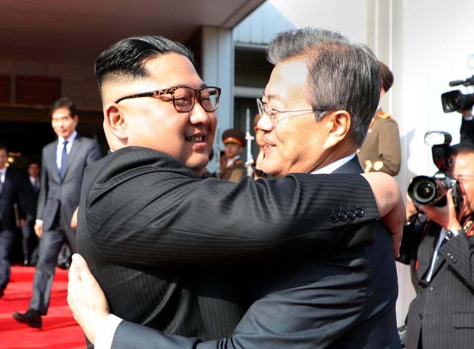  The two leaders embraced warmly as they battled to salvage peace talks