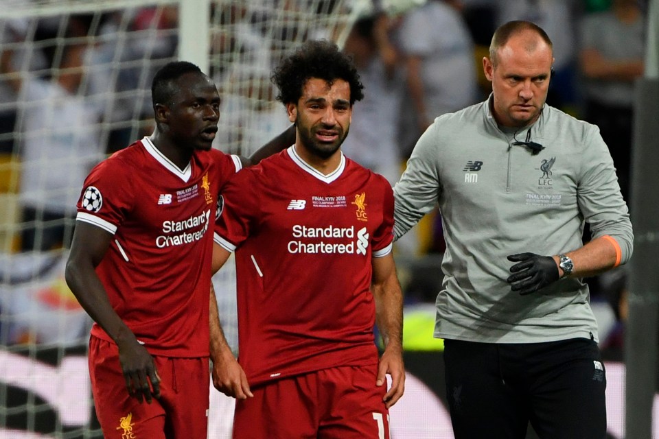 Sadio Mane consoles Salah as the winger leaves the pitch in tears