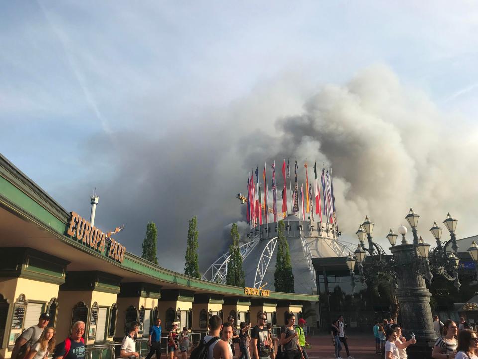  Smoke rises above the rides as the fire rages on at Europa-Park in Germany