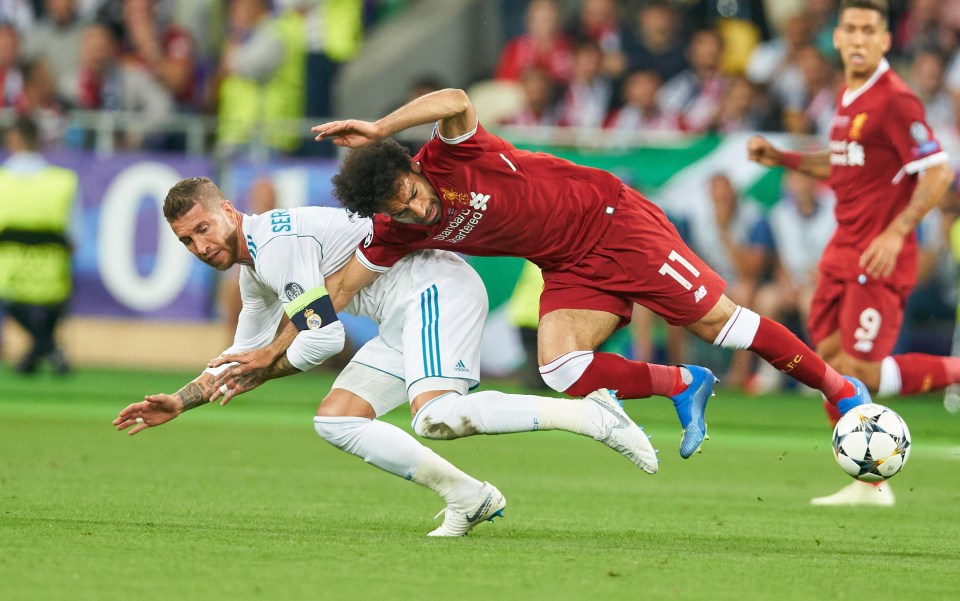 Mo Salah landed awkwardly on his shoulder after being hauled down by Sergio Ramos