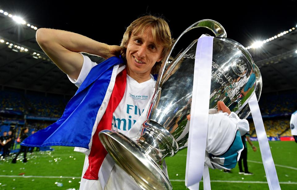  Luka Modric celebrates on the pitch in Kiev