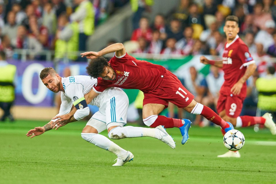 Mo Salah was injured when he was wrestled to the ground by Sergio Ramos