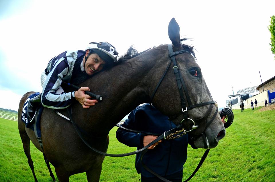  Colm O'Donoghue celebrates his win in the Irish 1000 Guineas with Alpha Centauri