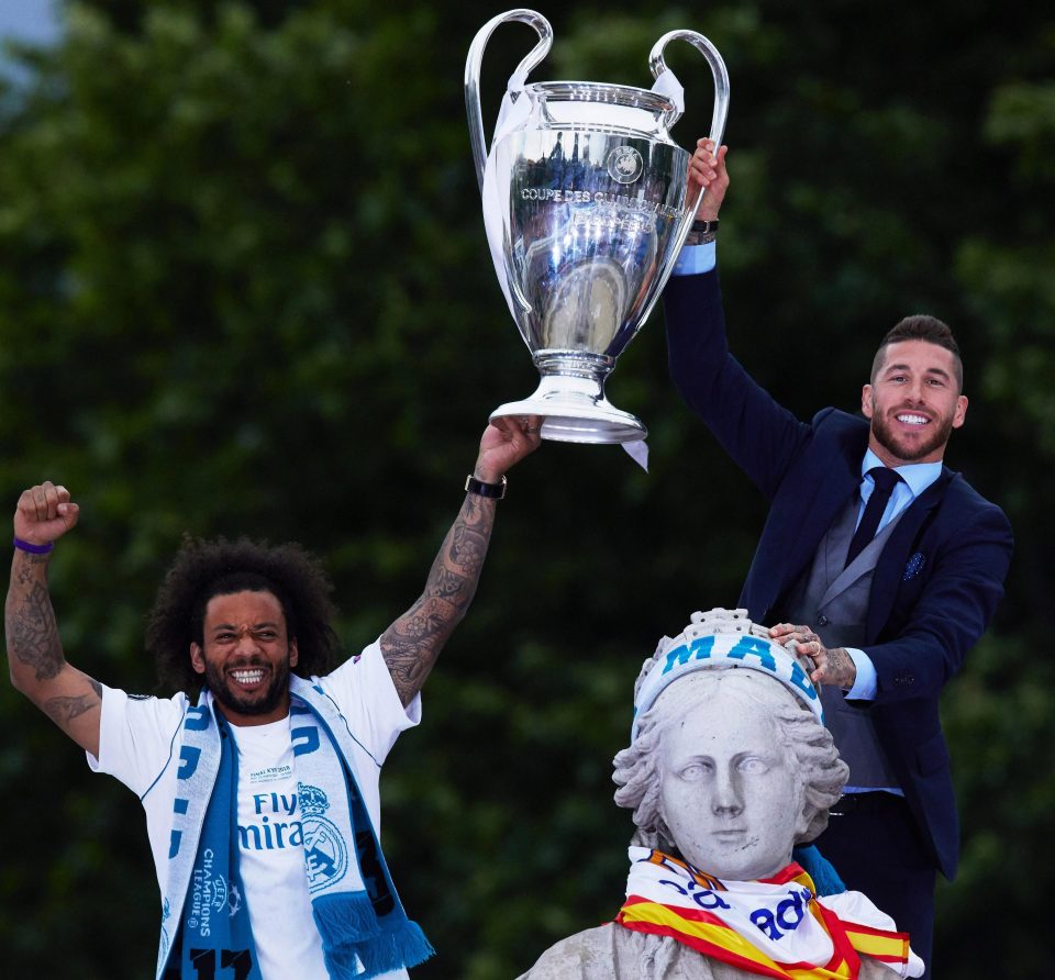  Marcelo and Sergio Ramos celebrate on Real Madrid's victory parade