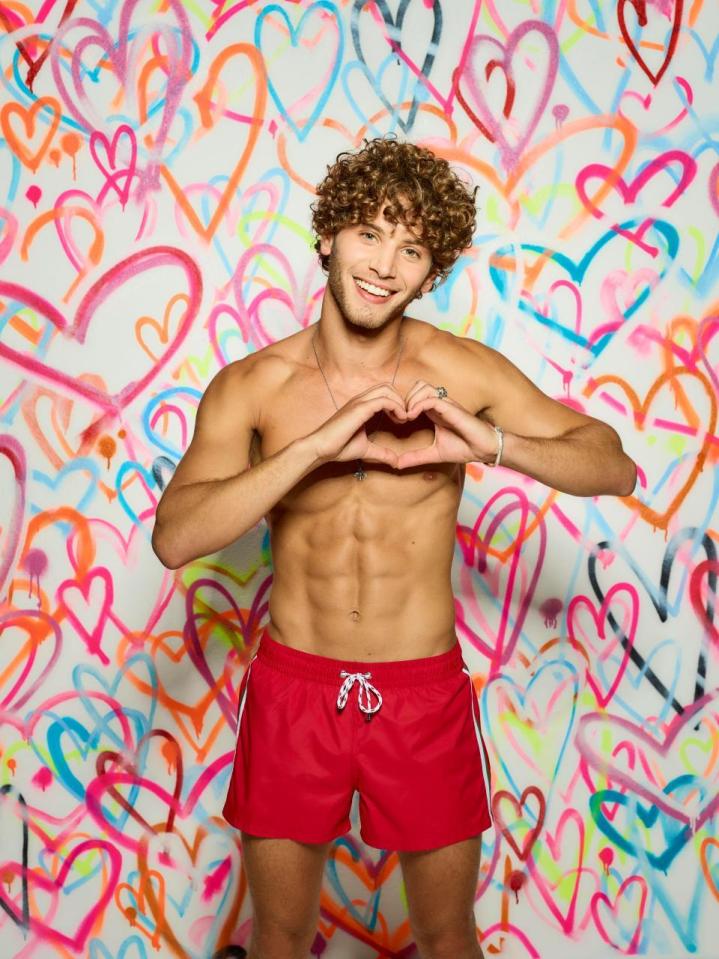  He may have beefed up since his pop star days but Eyal is still recognisable by his signature curly locks