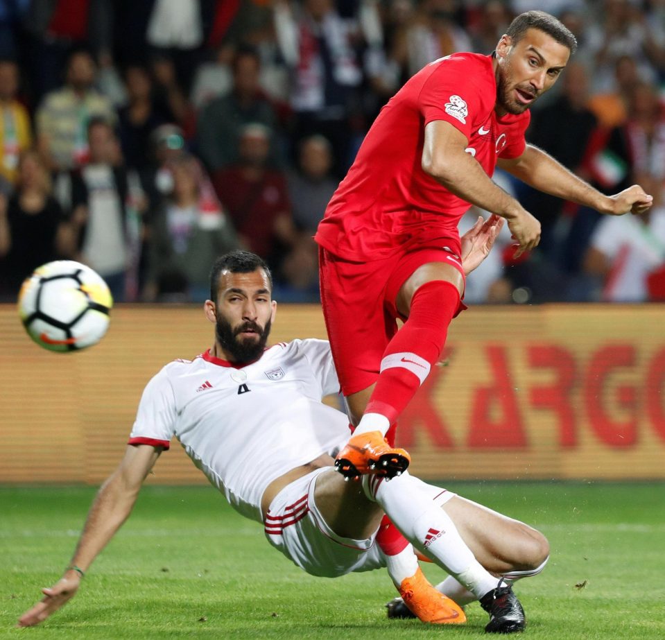  Cenk Tosun scores the first of his two goals against Iran