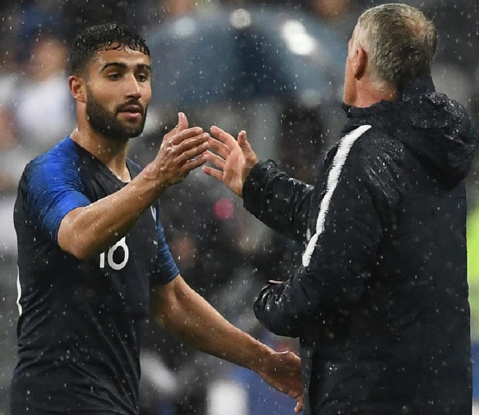 Liverpool target Nabil Fekir is congratulated by head coach Didier Deschamps after scoring against Ireland