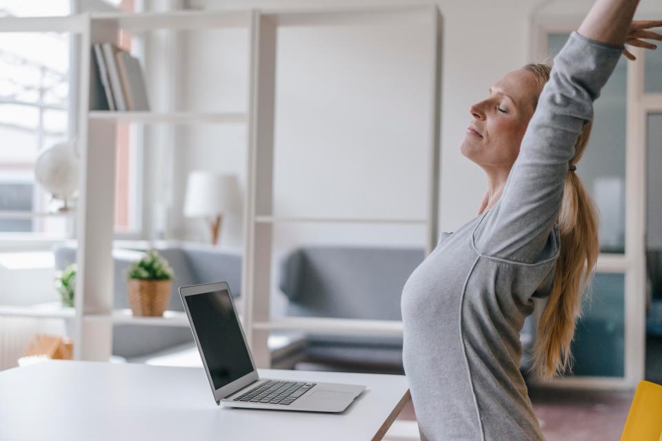  Stretching at your desk gets your blood pumping and boosts energy levels