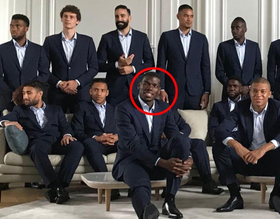  And the understated Leicester hero managed to hide behind Man United star Paul Pogba for a group shot