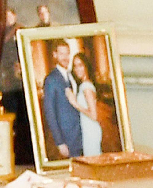  A photo of the newlyweds, Harry and Meghan, spotted in audience room in Buckingham Palace