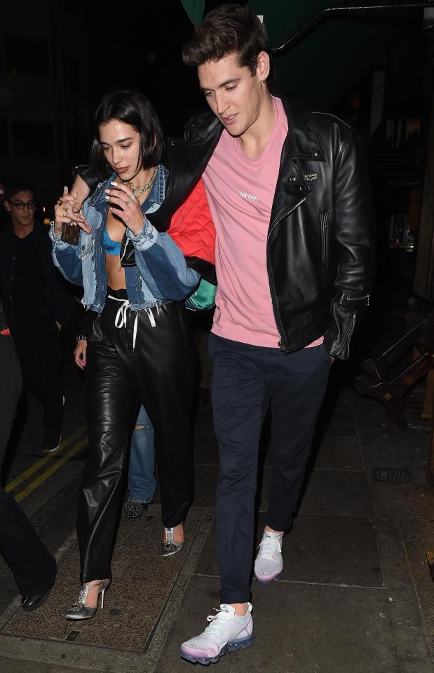  Dua and Issac were engrossed in conversation as they left London's Soho House