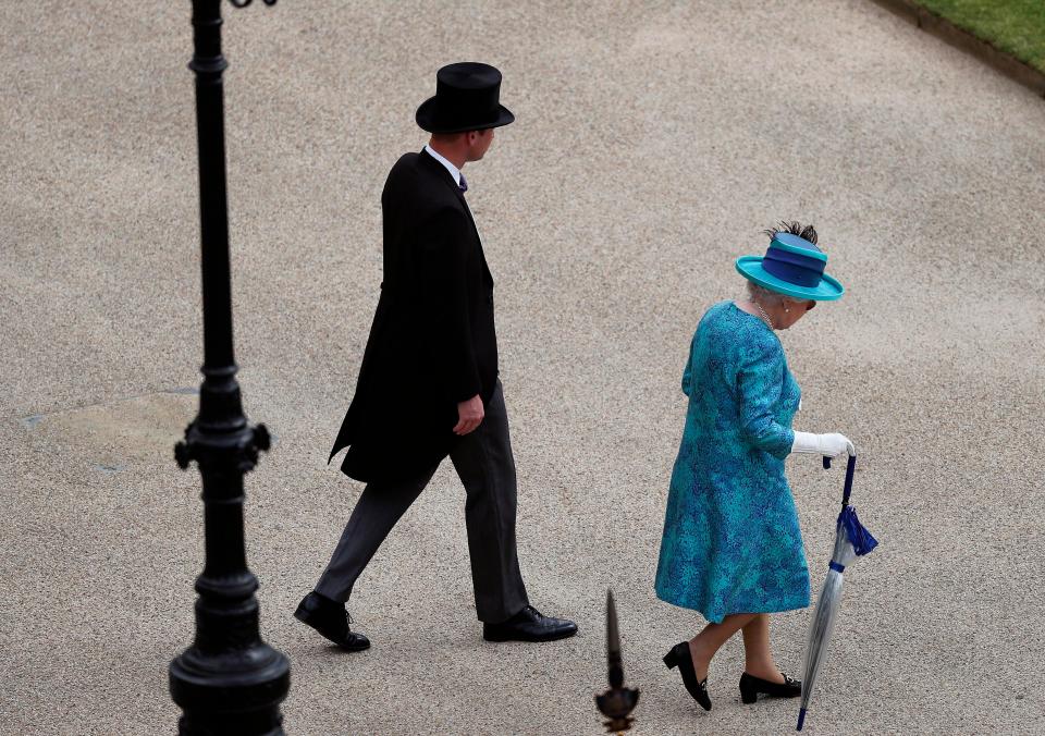  The Queen arrives with Prince William at Buckingham Palace