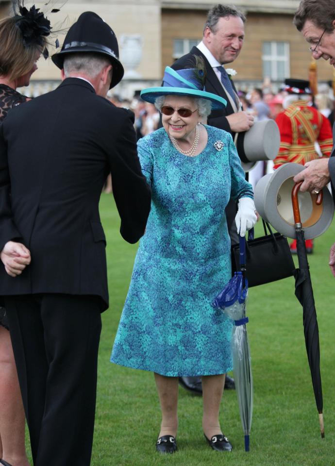  The Queen looked radiant in her turquoise and teal coat dress