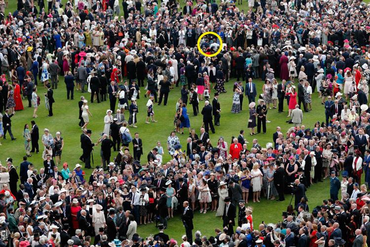  The Queen looked extravagant in a turquoise and teal coat dress, but she was surrounded by thousands keen to greet her