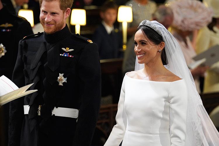  The beaming couple held hands during the ceremony, with the groom becoming overcome with emotion