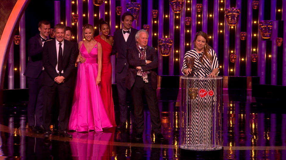  Dec seemed more comfortable hiding behind his co-stars while producers accepted the award