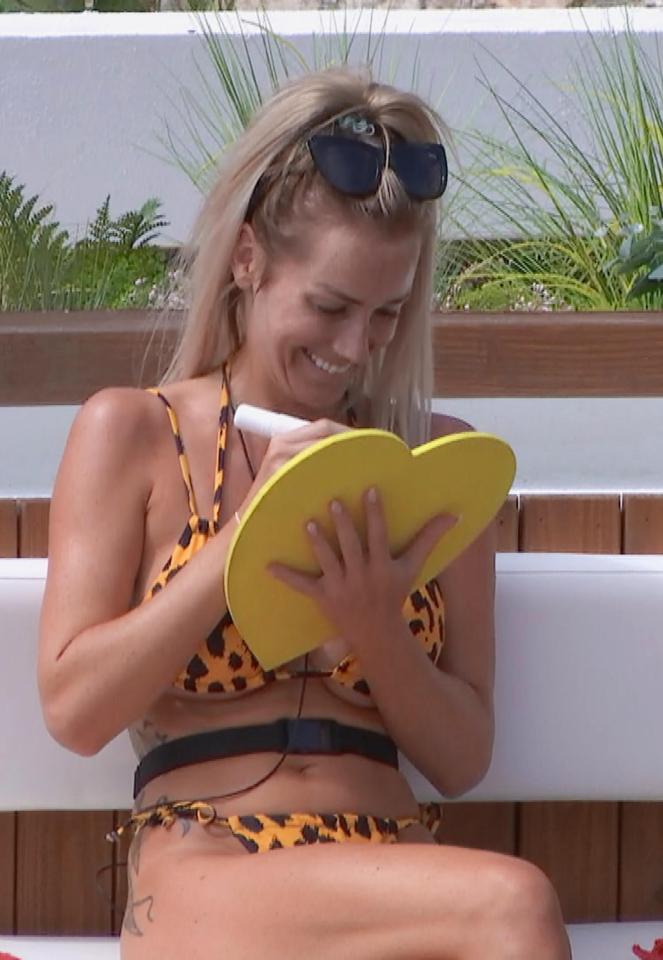  Laura's yellow leopard print bikini was a favourite among fans