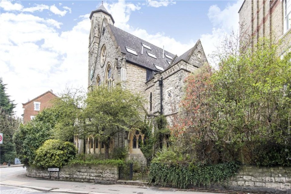 The flat is set over 3 levels of this historic converted church