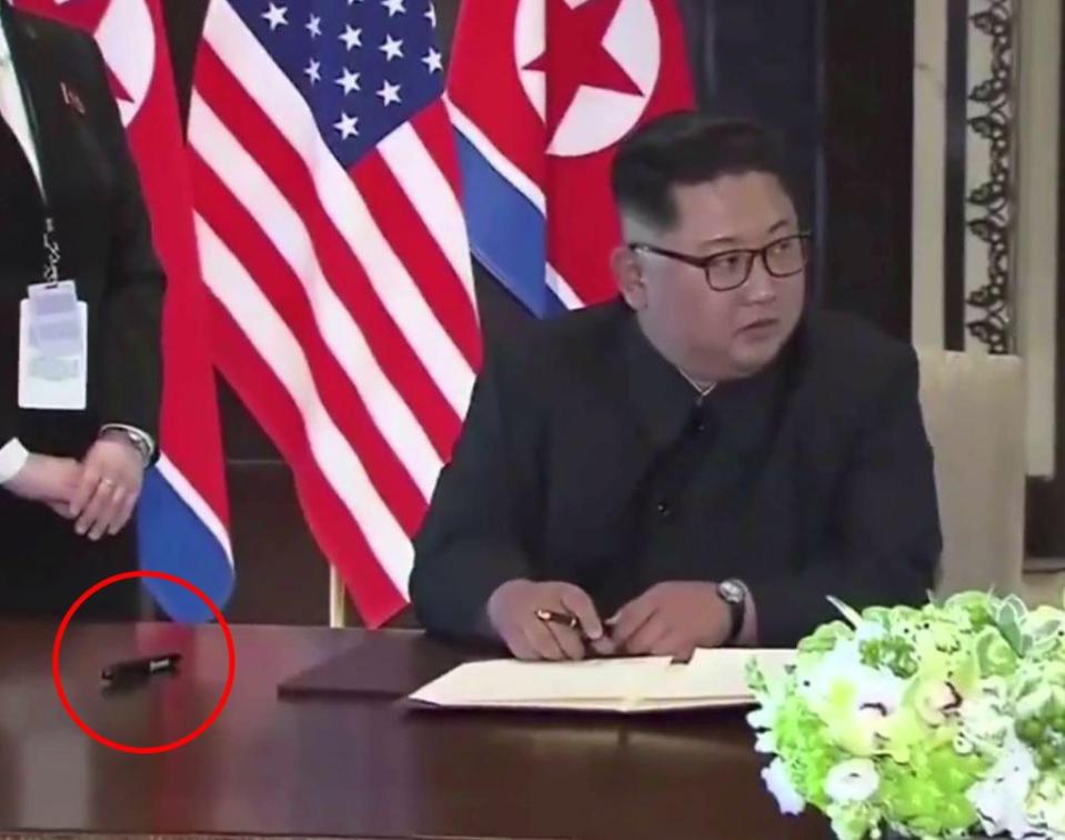  Kim ended up signing the nuclear disarmament deal with his sister's pen... the pen Trump provided was left to one side