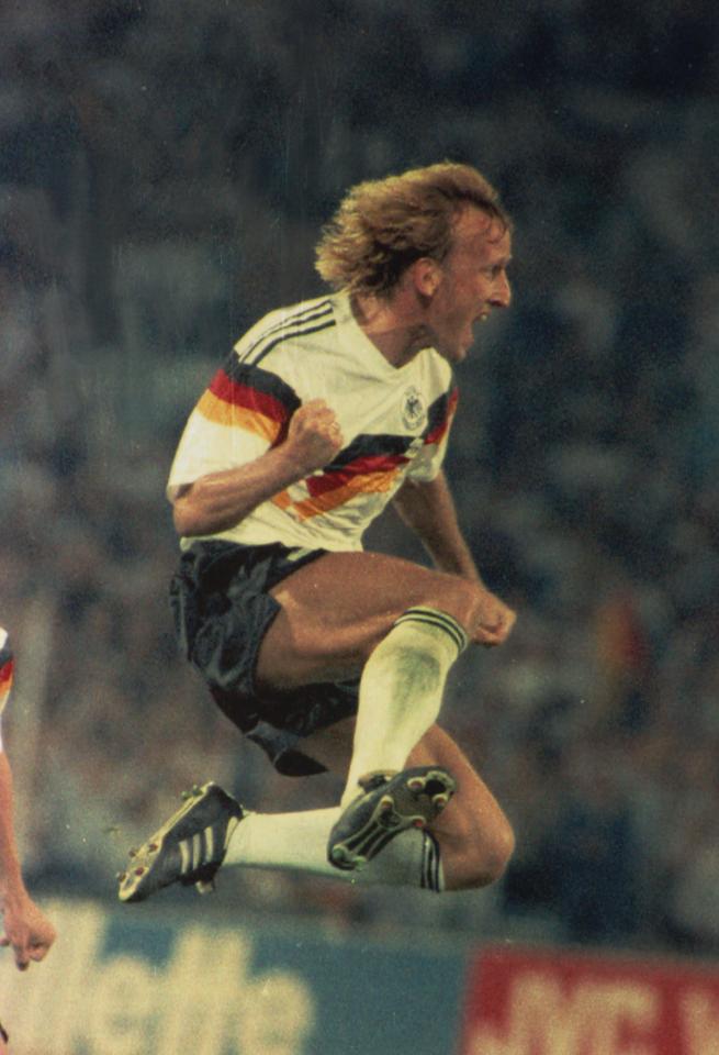  Andreas Brehme leaps with joy after putting West Germany 1-0 up