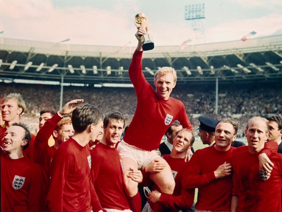  England legend Bobby Moore celebrates in 1966 with his World Cup-winning teammates