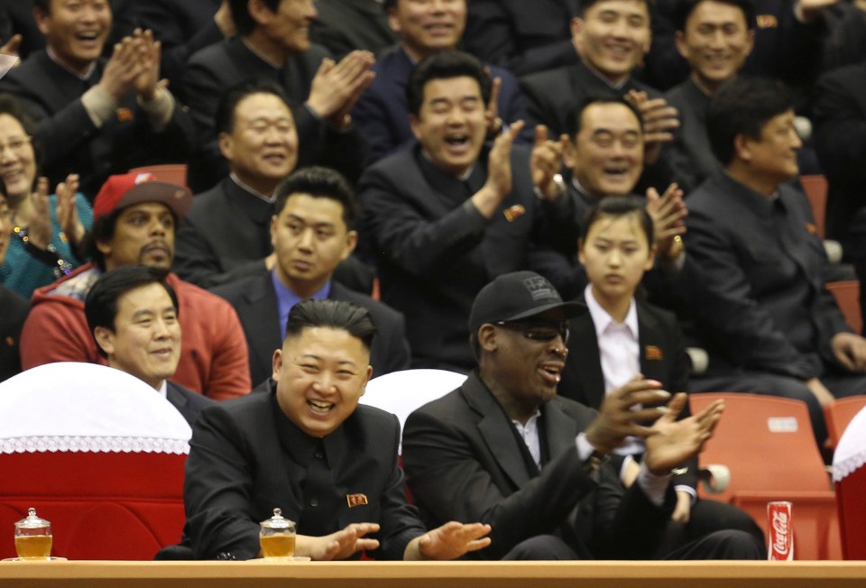 Shared passion.... Kim and Rodman at a basketball game 