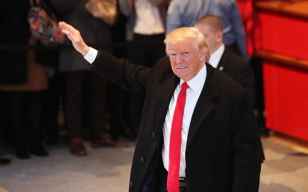 Donald Trump in the lobby of the New York Times following a meeting with the editors in November 2016