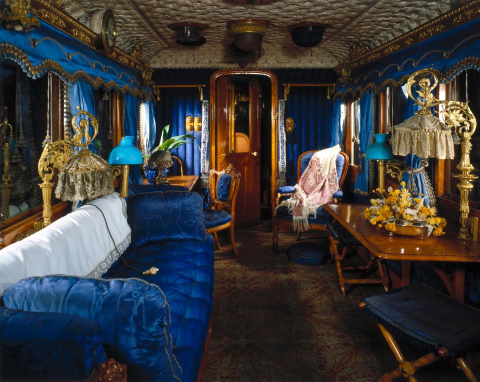  The train's saloon is the epitome of extravagance with its blue and gold theme