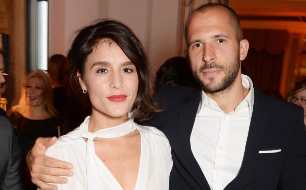 Jessie Ware, left, with husband Sam Burrows, right at the Harper's Bazaar Women Of The Year Awards in 2014